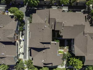 Multi-unit property featuring complex rooflines and a central courtyard