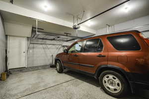 Attached garage with epoxy-coated flooring