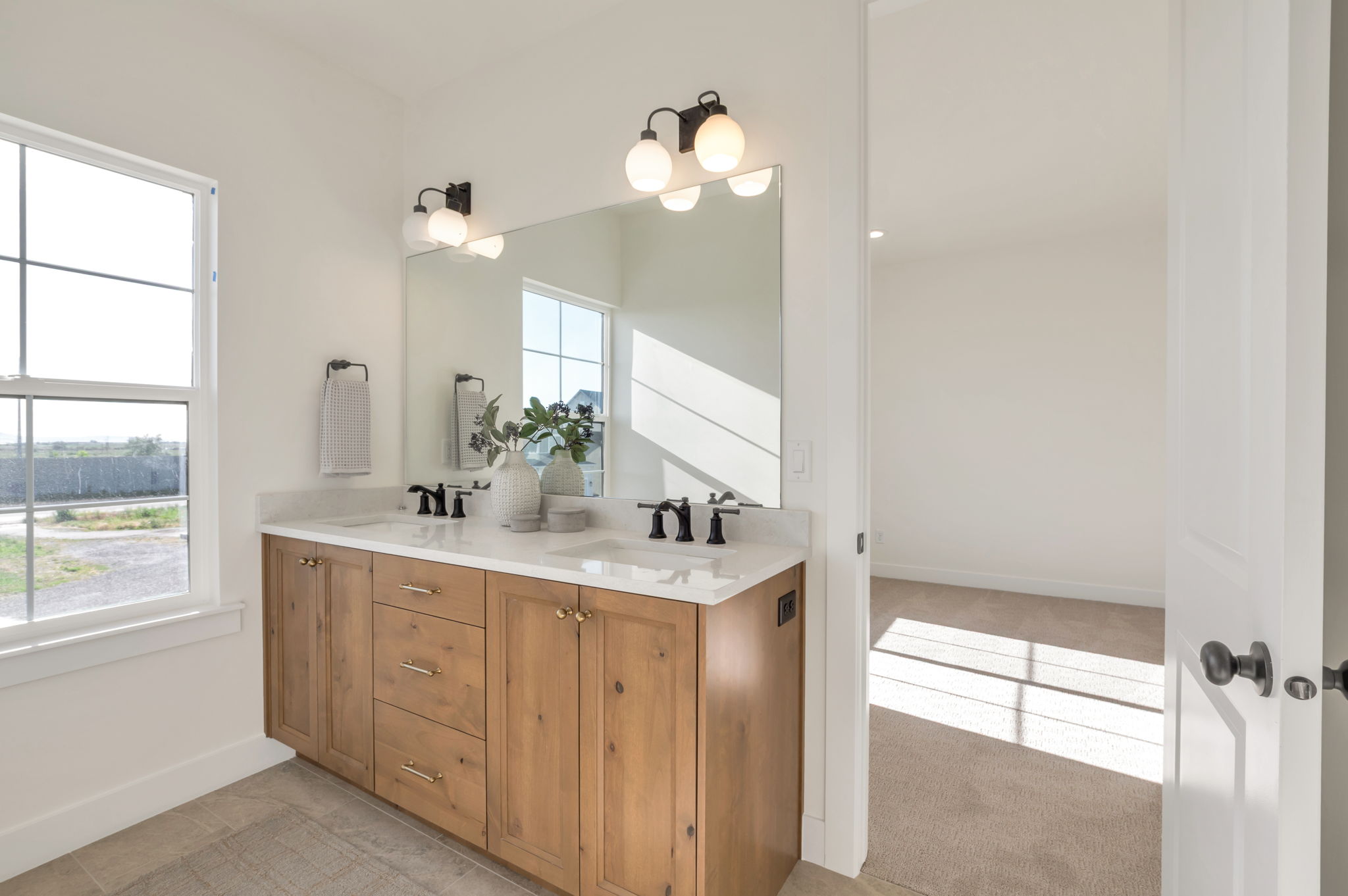 "Jack and Jill" bathroom between additional bedrooms.