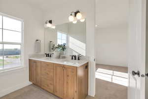 "Jack and Jill" bathroom between additional bedrooms.