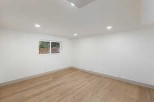 Hardwood flooring complementing white walls