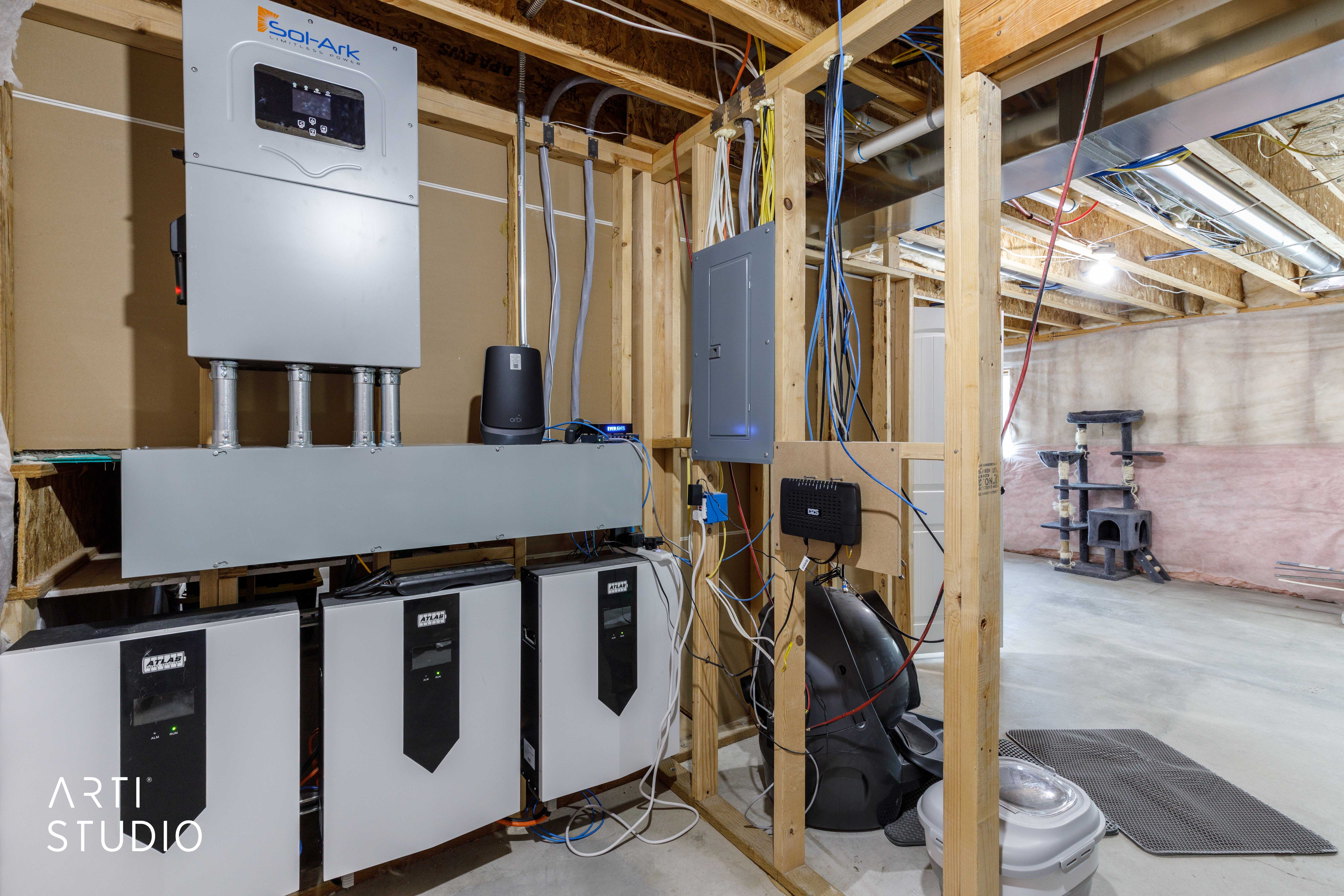 Integrated solar power system featuring a Sol-Ark inverter and three Atlas battery storage units