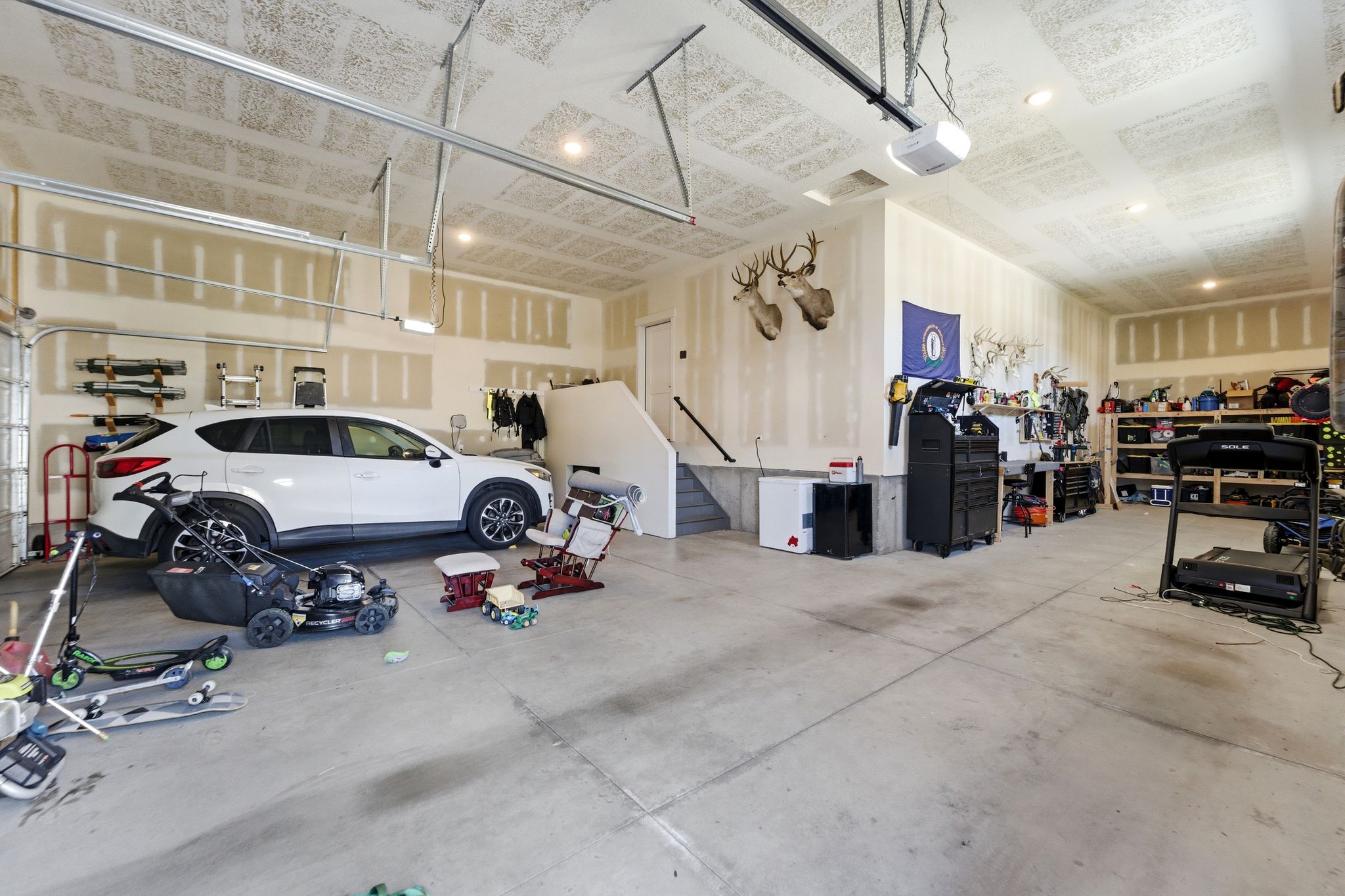Spacious garage with built in storage and room for 4 cars!