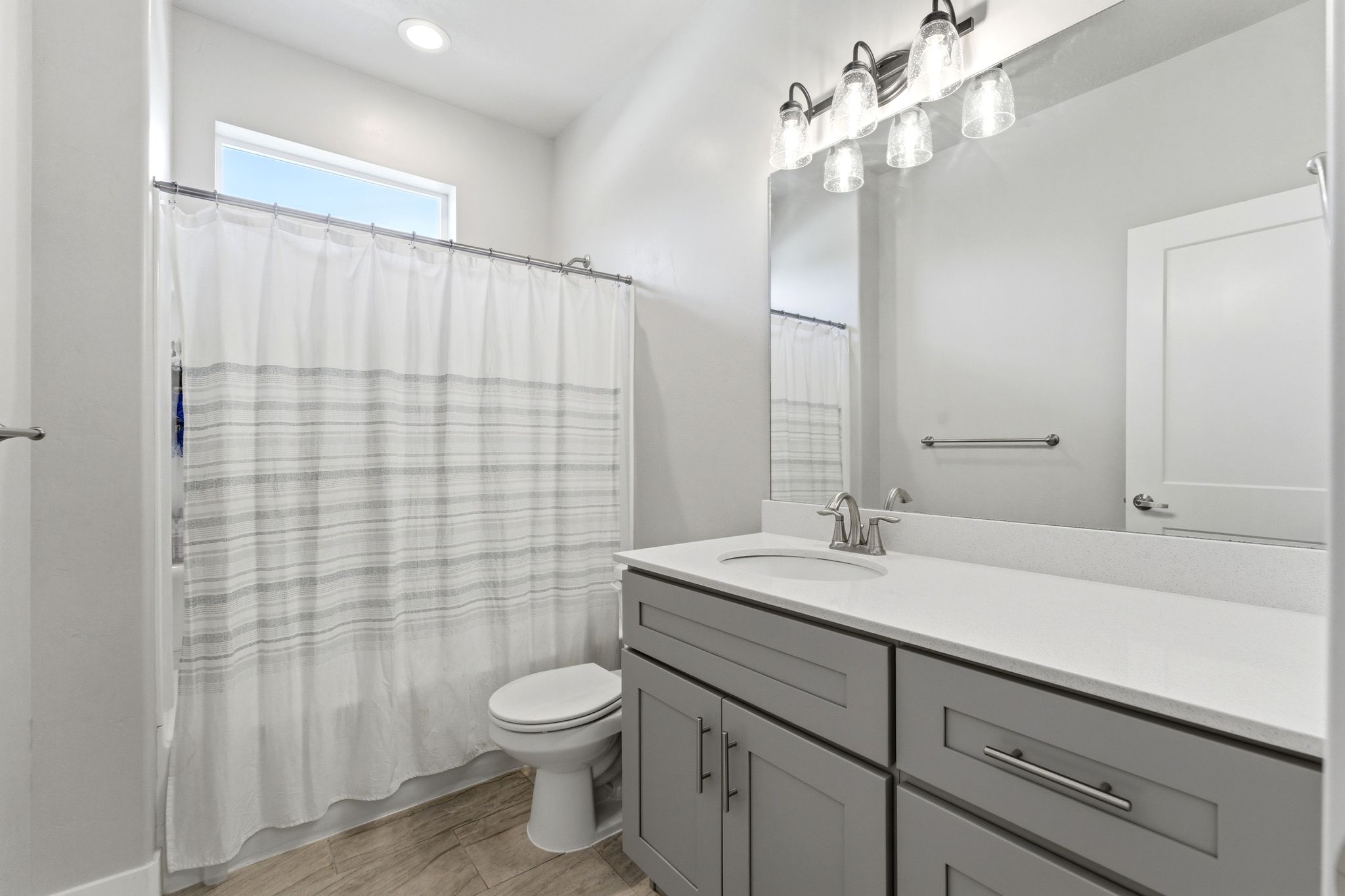 Main floor bathroom with nice vanity.