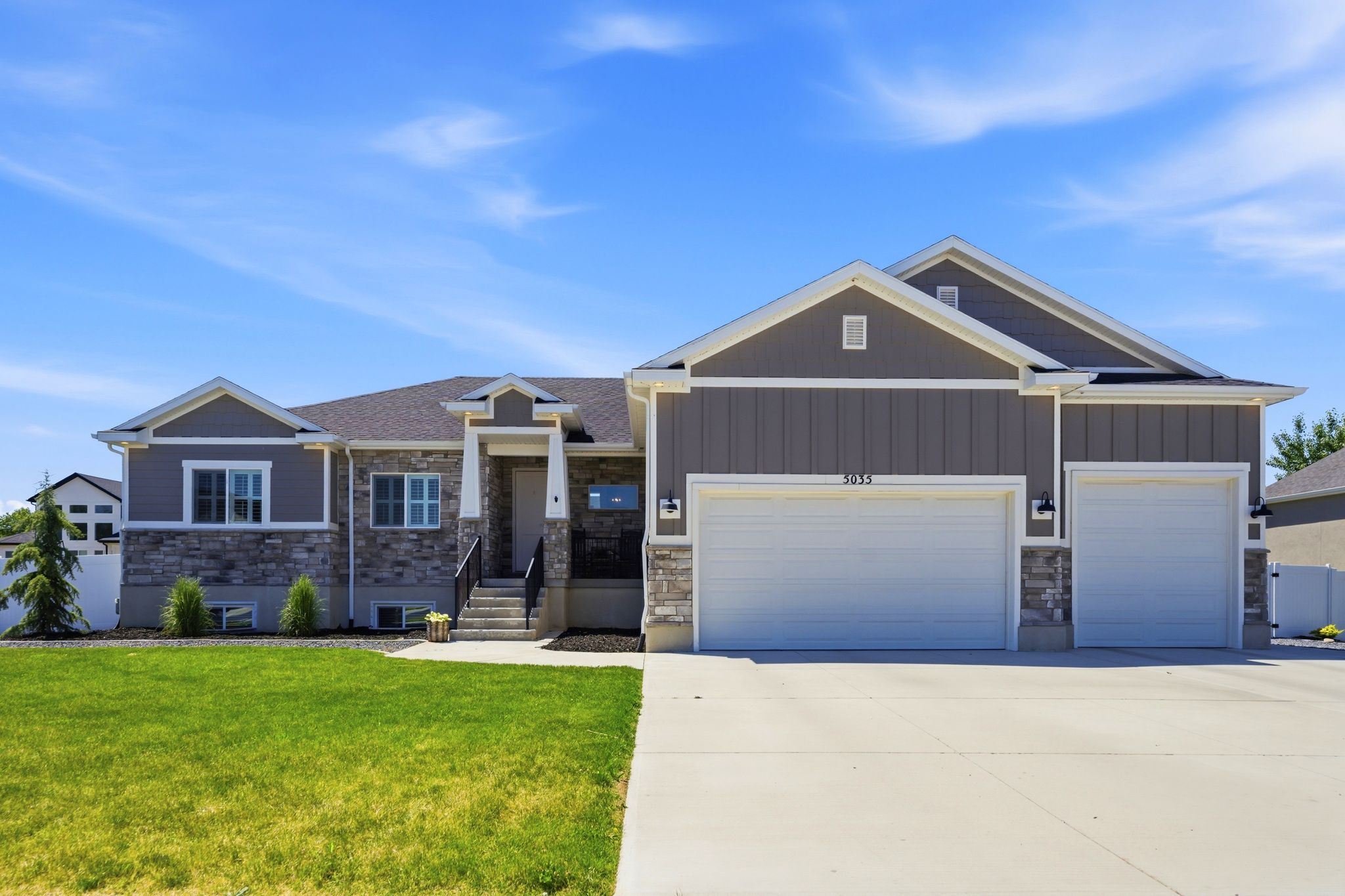 Rambler with timeless exterior, 4 car garage and RV parking.