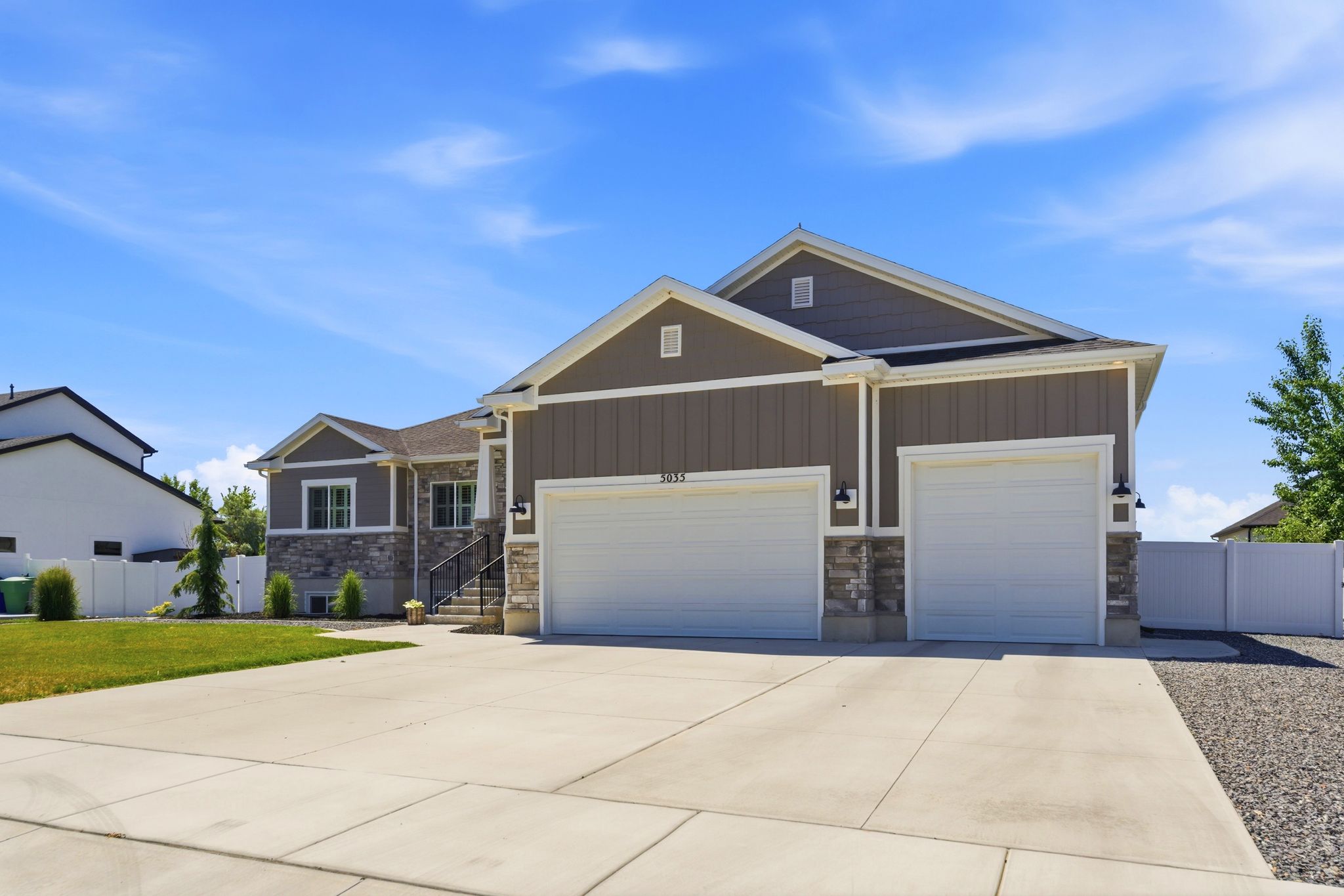Rambler with timeless exterior, 4 car garage and RV parking.