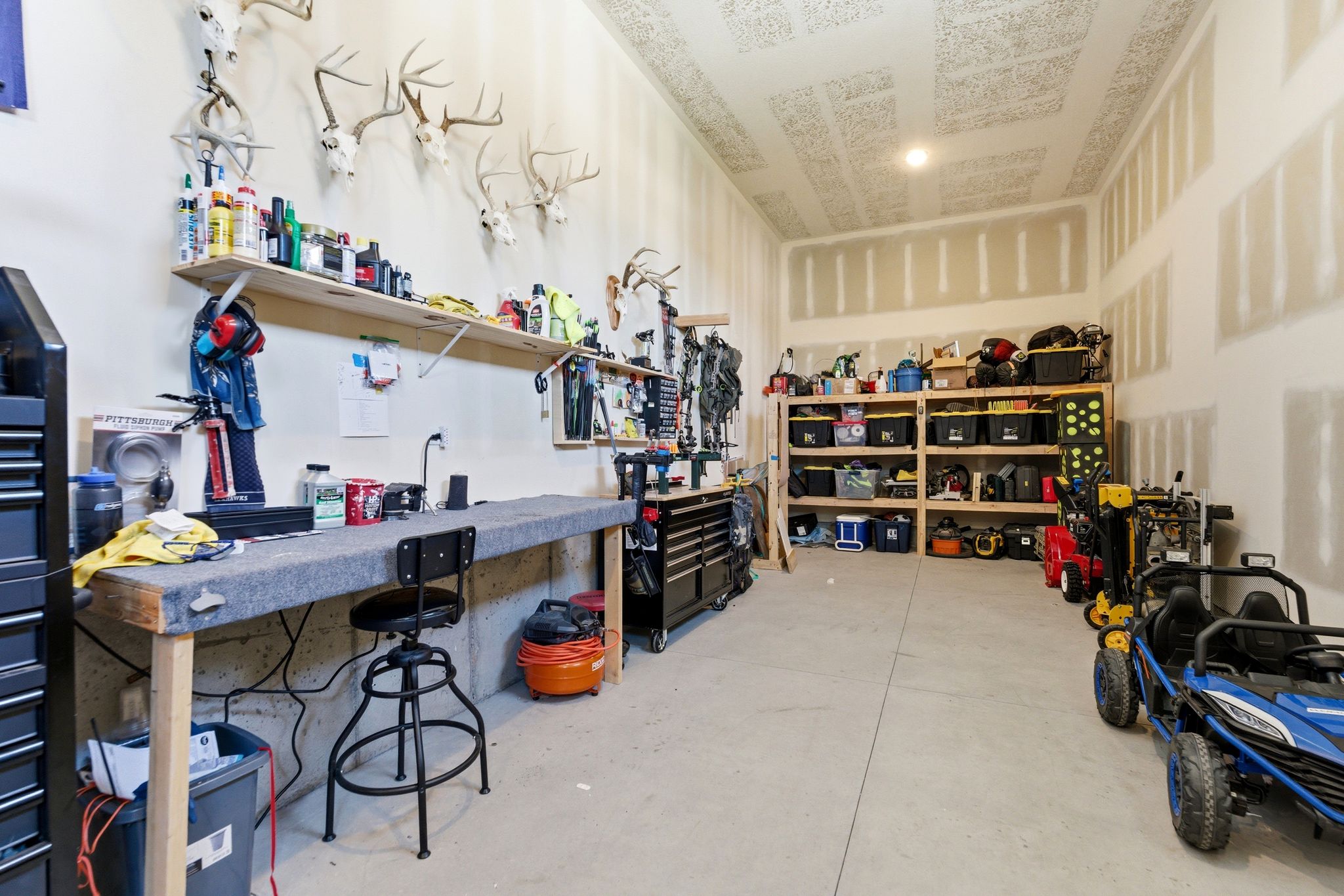 Spacious garage with built in storage and room for 4 cars!