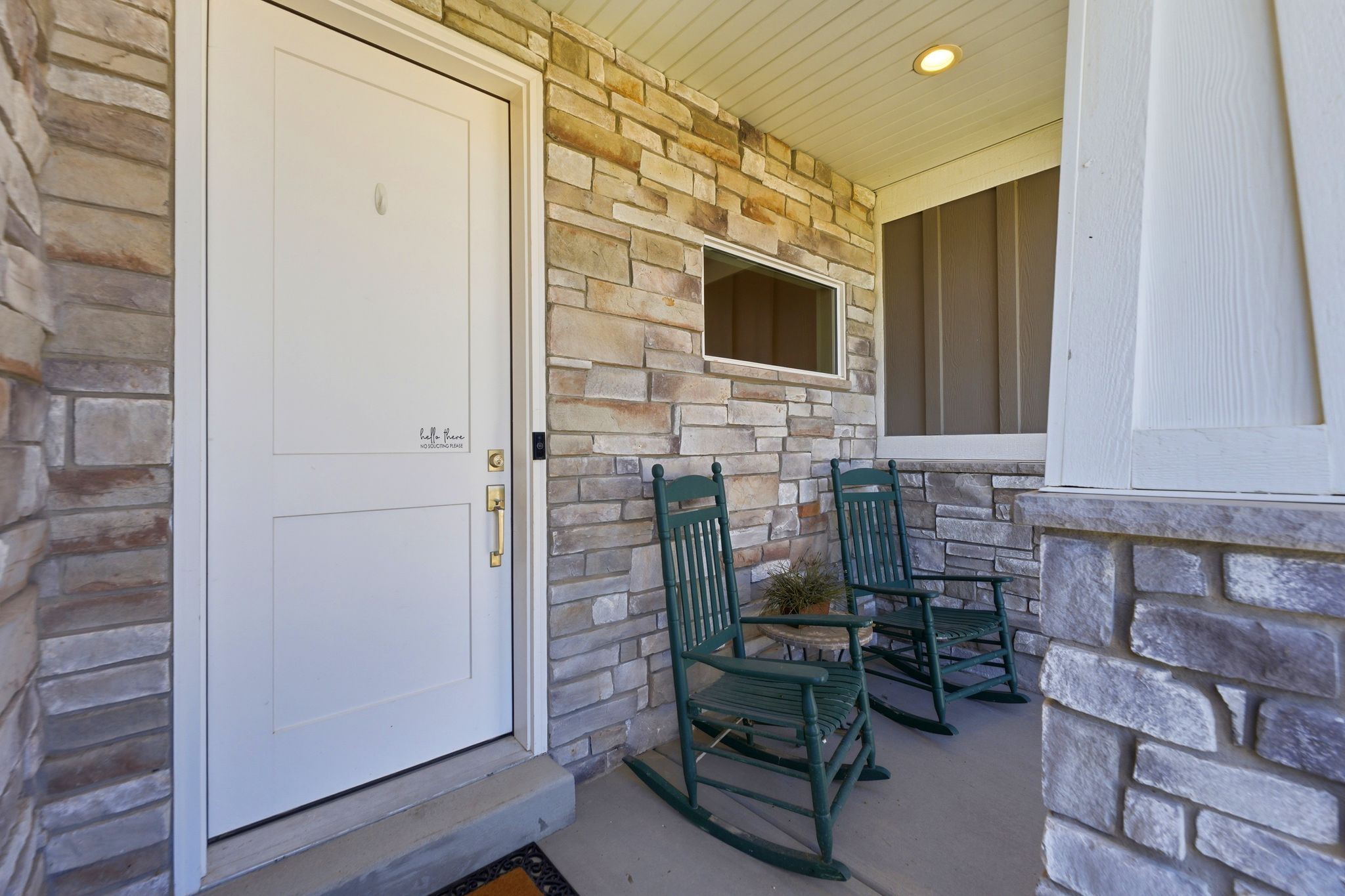 Fun front porch to enjoy the neighborhood!