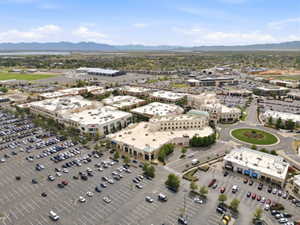 Expansive commercial development featuring multiple retail buildings with ample surface parking