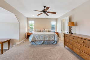 Neutral tone walls with an arched entry