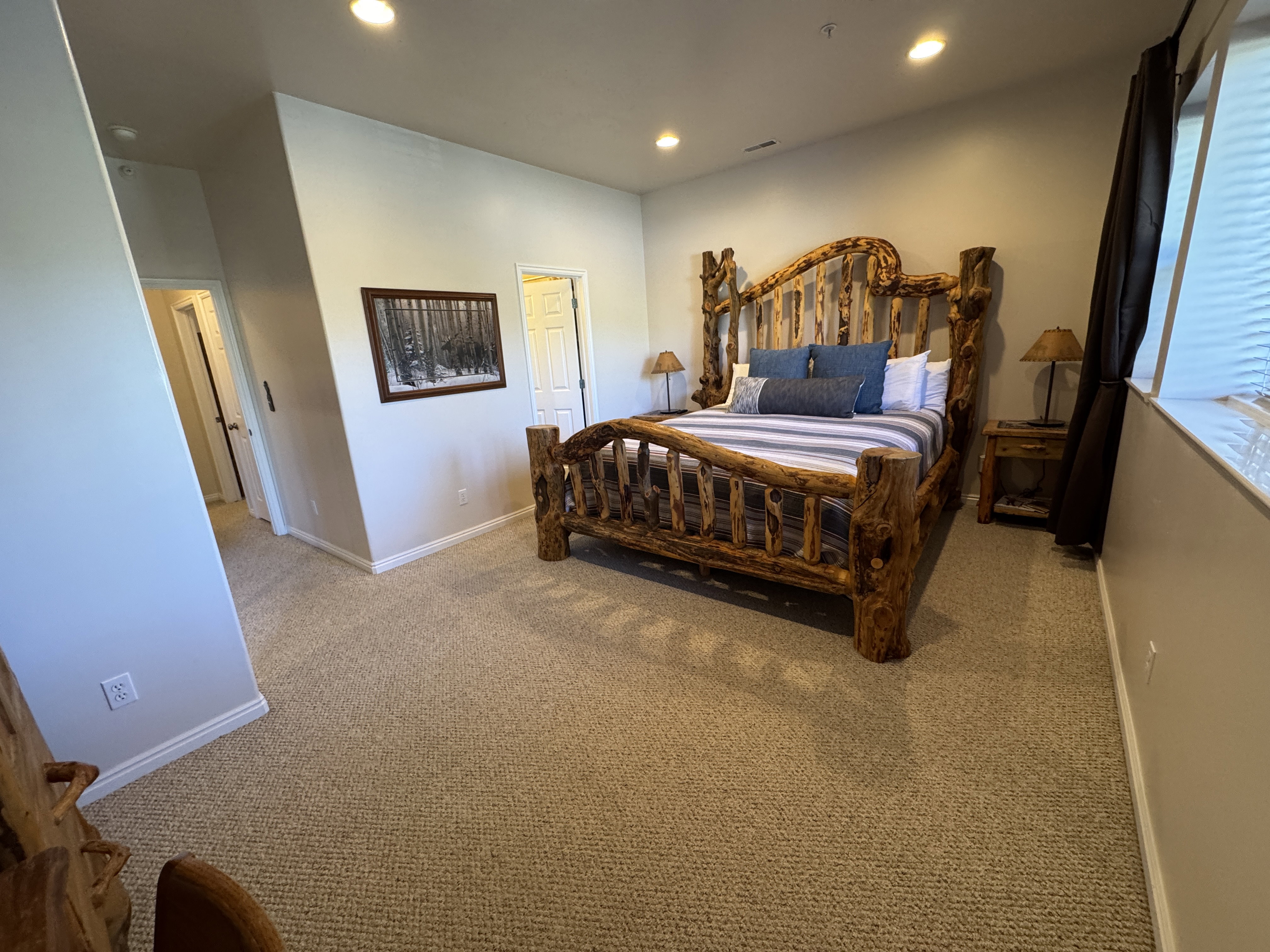 Primary bedroom with large closet and attached bathroom