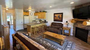 Open concept living area with gas fireplace