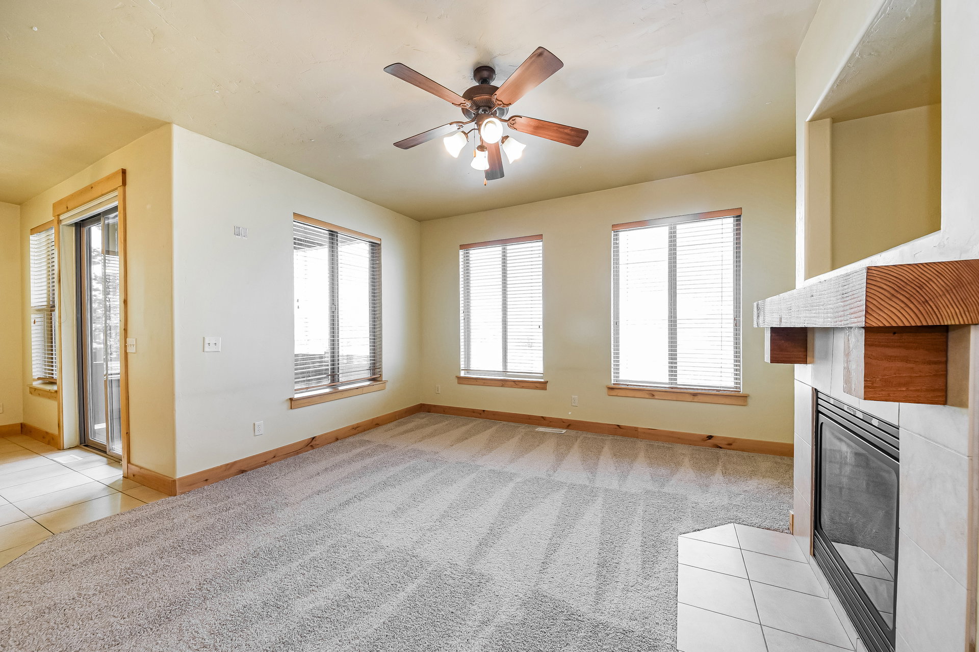 Living space with light-toned walls and contrasting wood trim