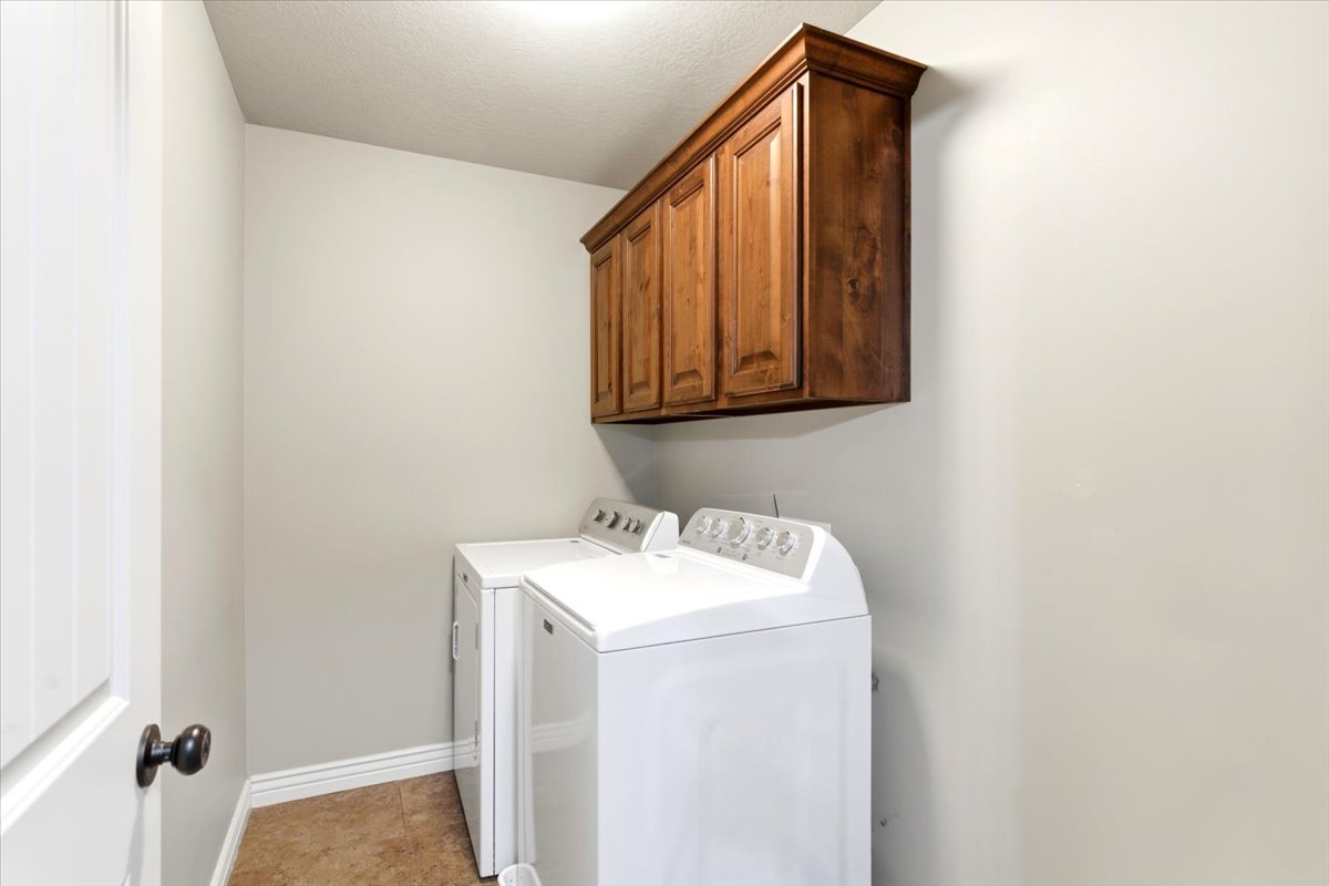 Wood-finish cabinetry providing overhead storage