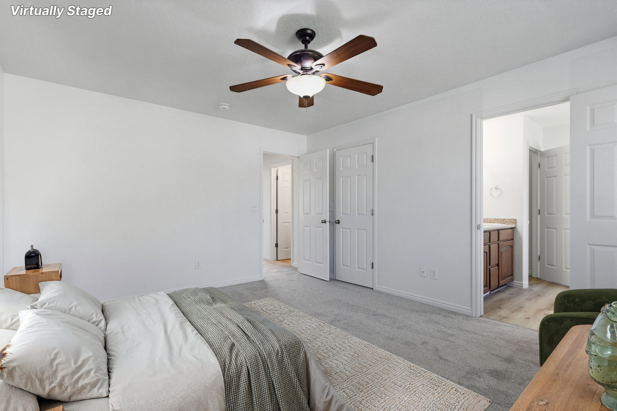 Neutral interior with light gray carpeting and white walls