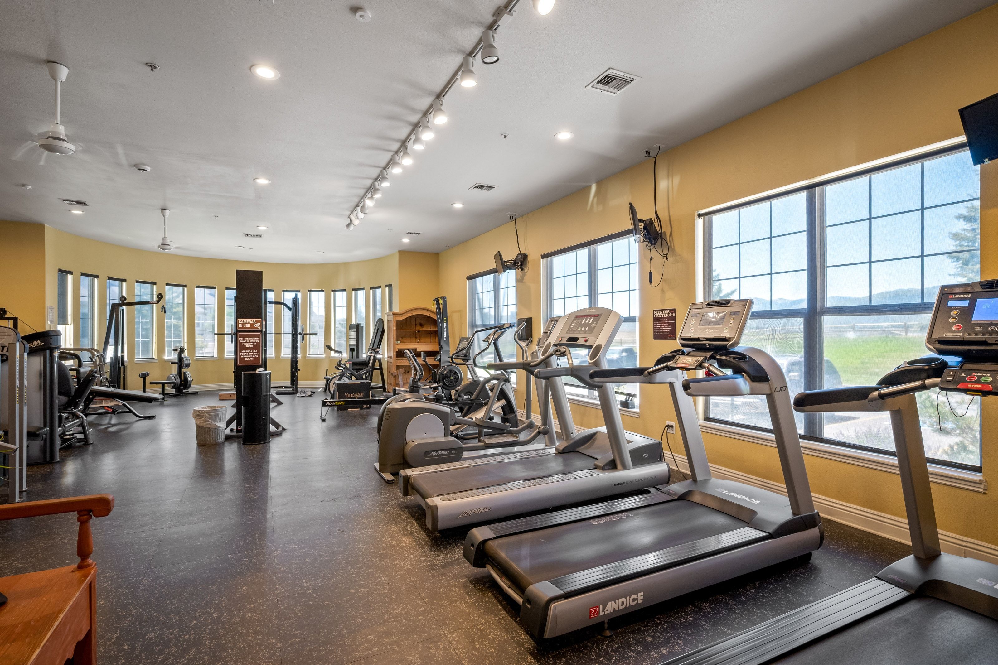 Dedicated fitness center featuring cardio and weight training equipment