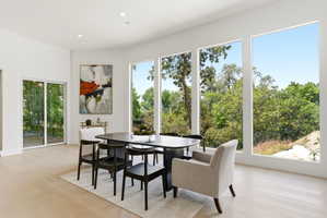 Bright interior space featuring light wood-finish flooring