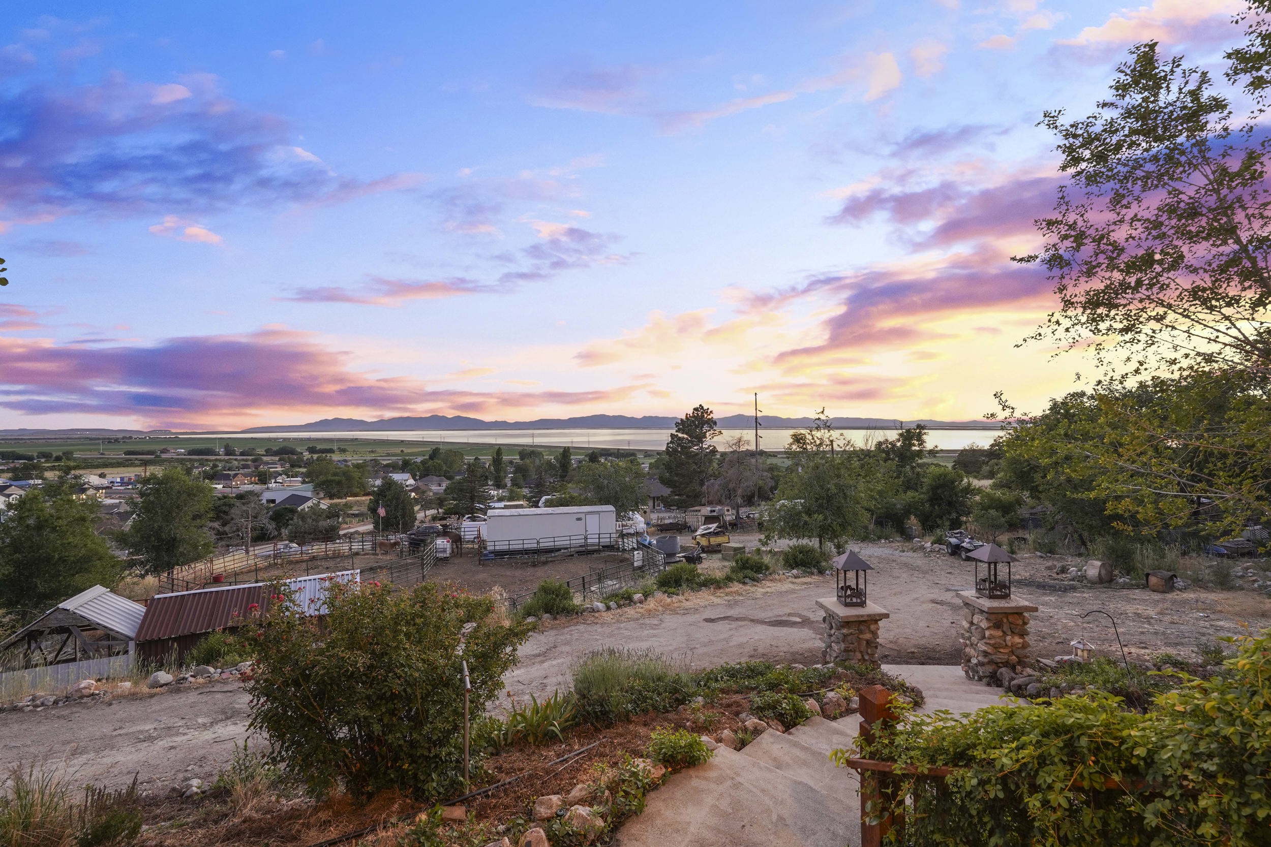 Expansive property with distant lake and mountain scenery