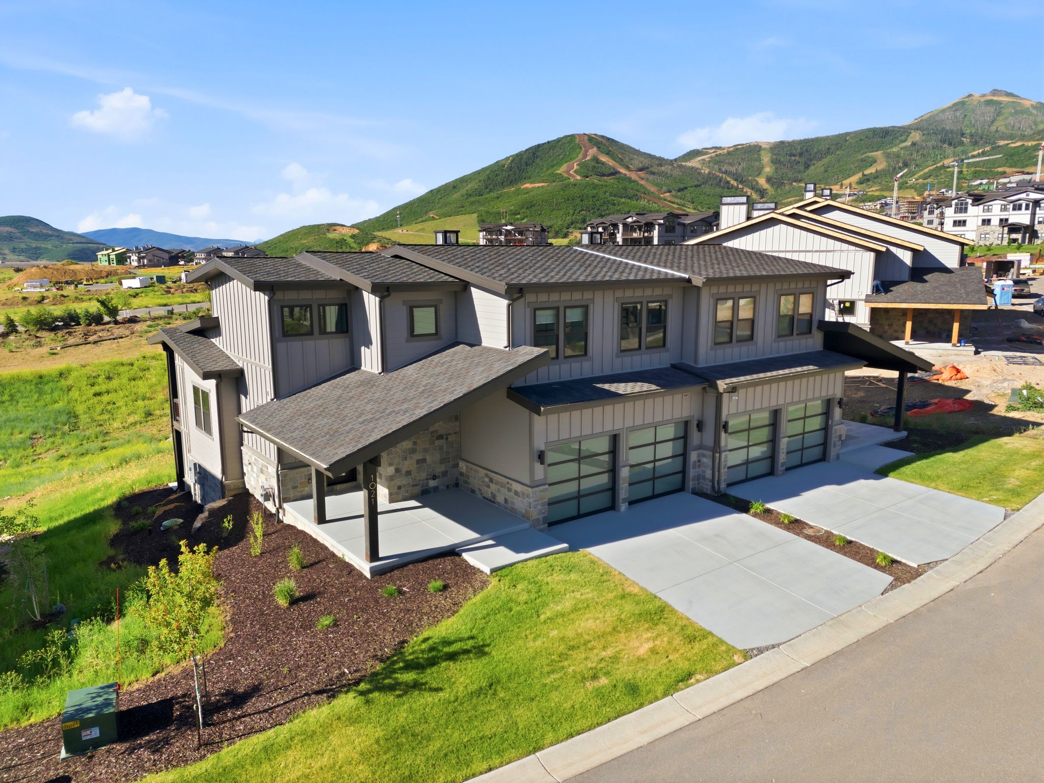 Modern exterior with a striking gray and stone façade