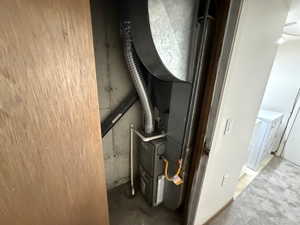 Utility closet featuring a newer HVAC (2023)