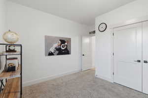 #3 White interior walls with a light-colored carpet flooring
