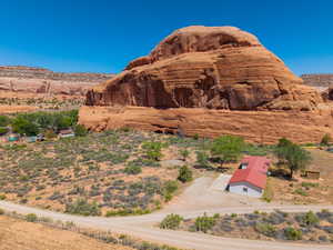 Property situated against a striking red rock formation
