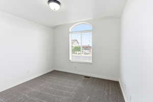 Arched window with horizontal blinds