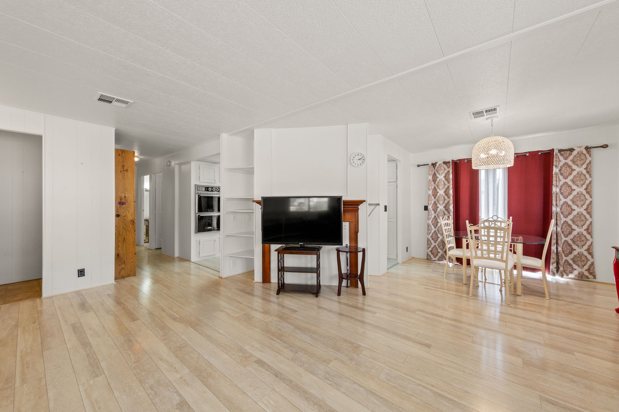 Open concept interior featuring light wood-finish flooring