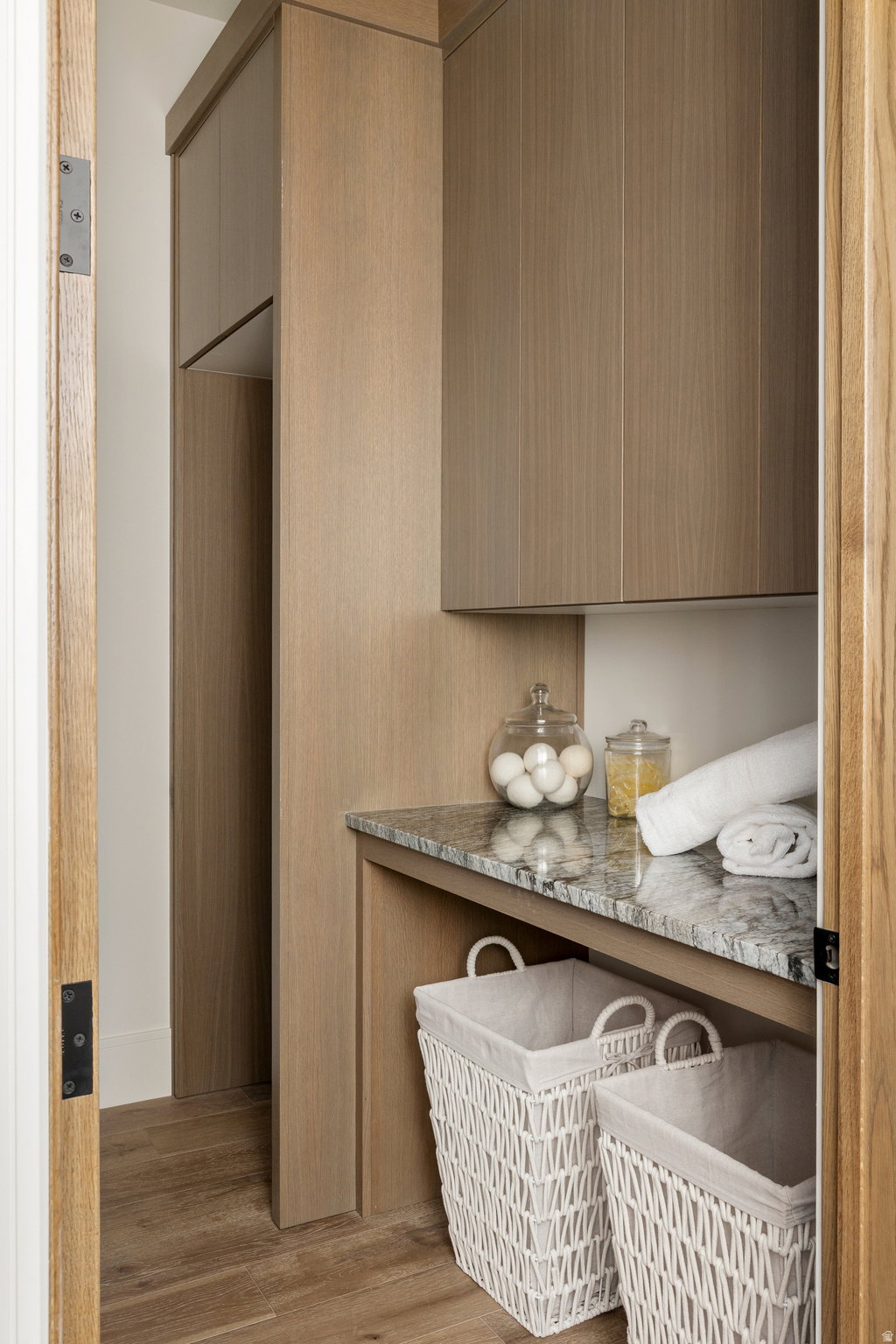 Main level laundry for stackable W/D with countertop & cabinetry