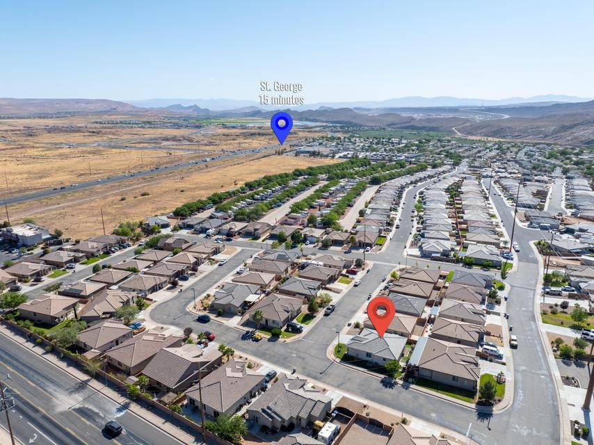 Aerial perspective showcasing a residential neighborhood with single-story homes