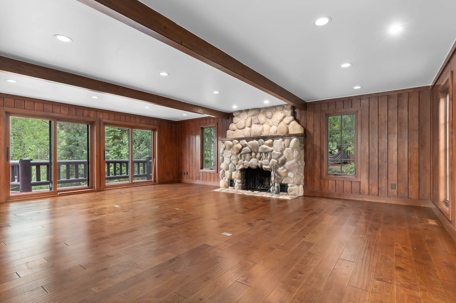 A real river rock wood burning fireplace.