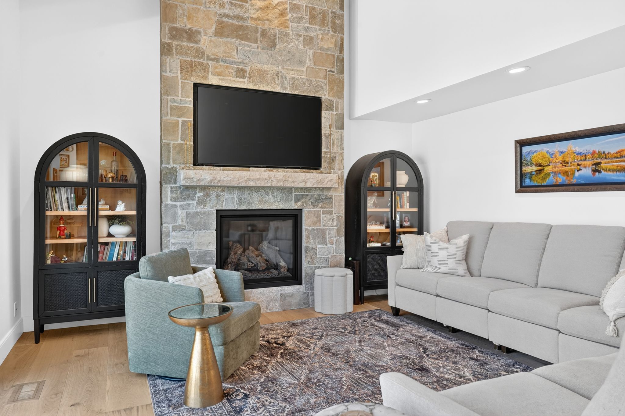 Two-story stone fireplace with hearth