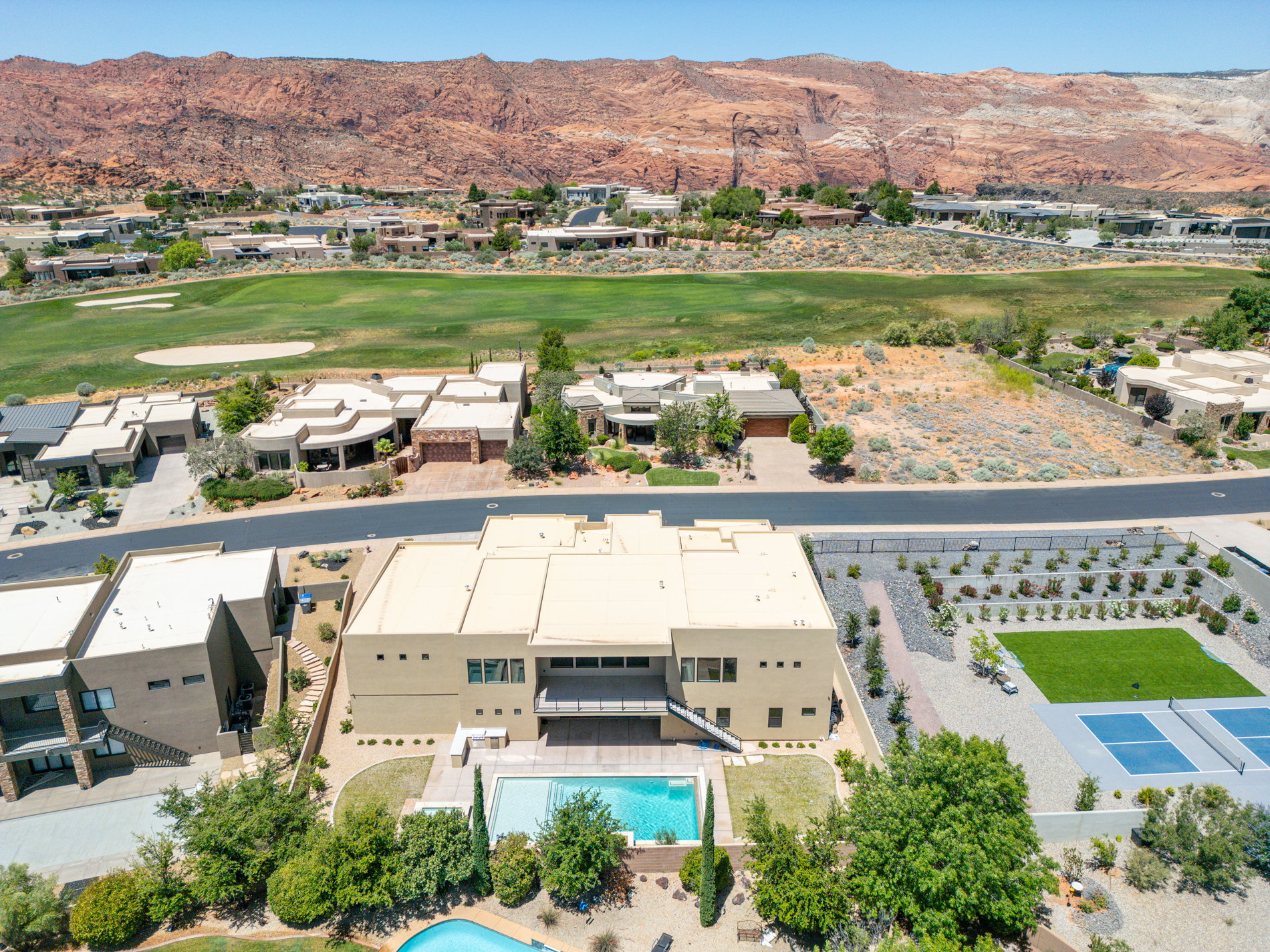 Modern desert-style residence with a flat roofline and stucco exterior
