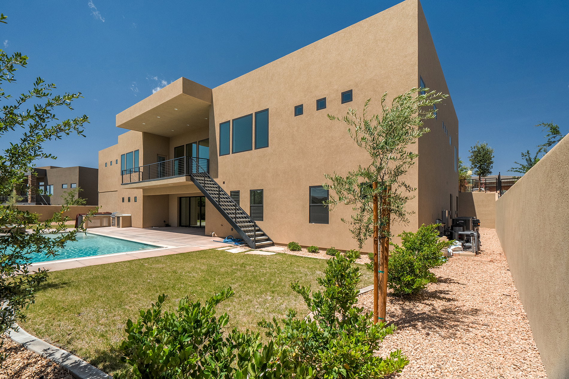 Contemporary stucco exterior with a multi-level design