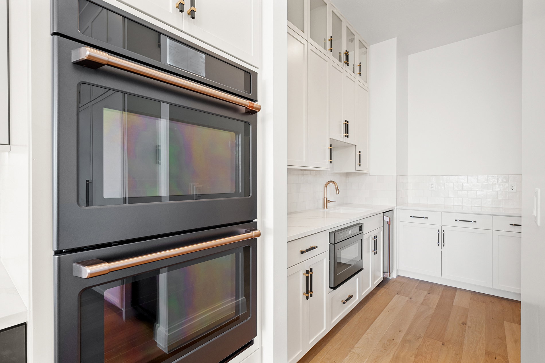 Double wall oven with rose gold-tone hardware