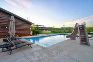 Outdoor swimming pool with concrete surround