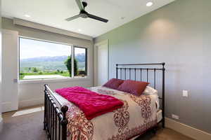 Expansive window framing mountain and valley scenery