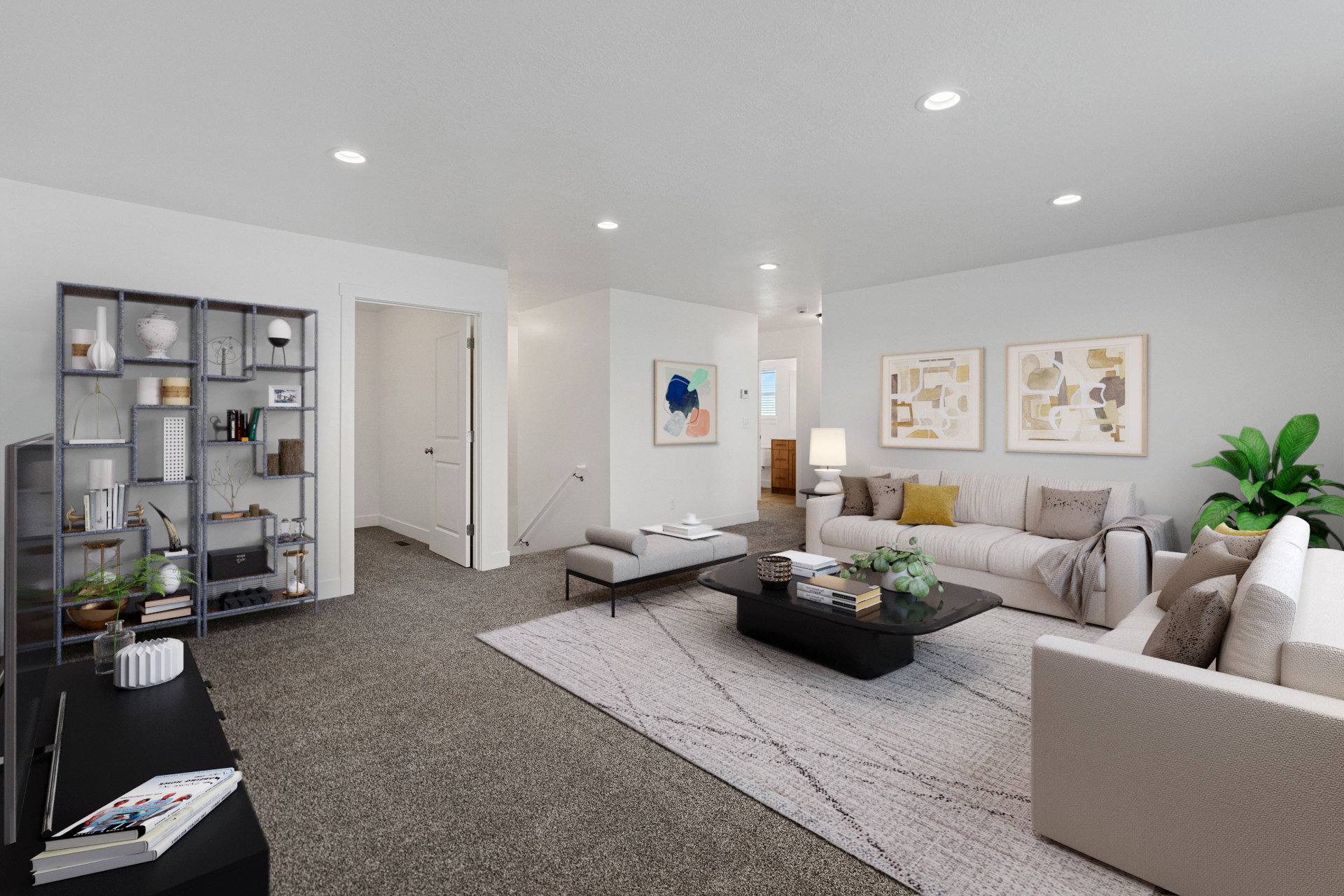 Spacious living area featuring neutral carpeting, recessed lighting, and white wall finishes