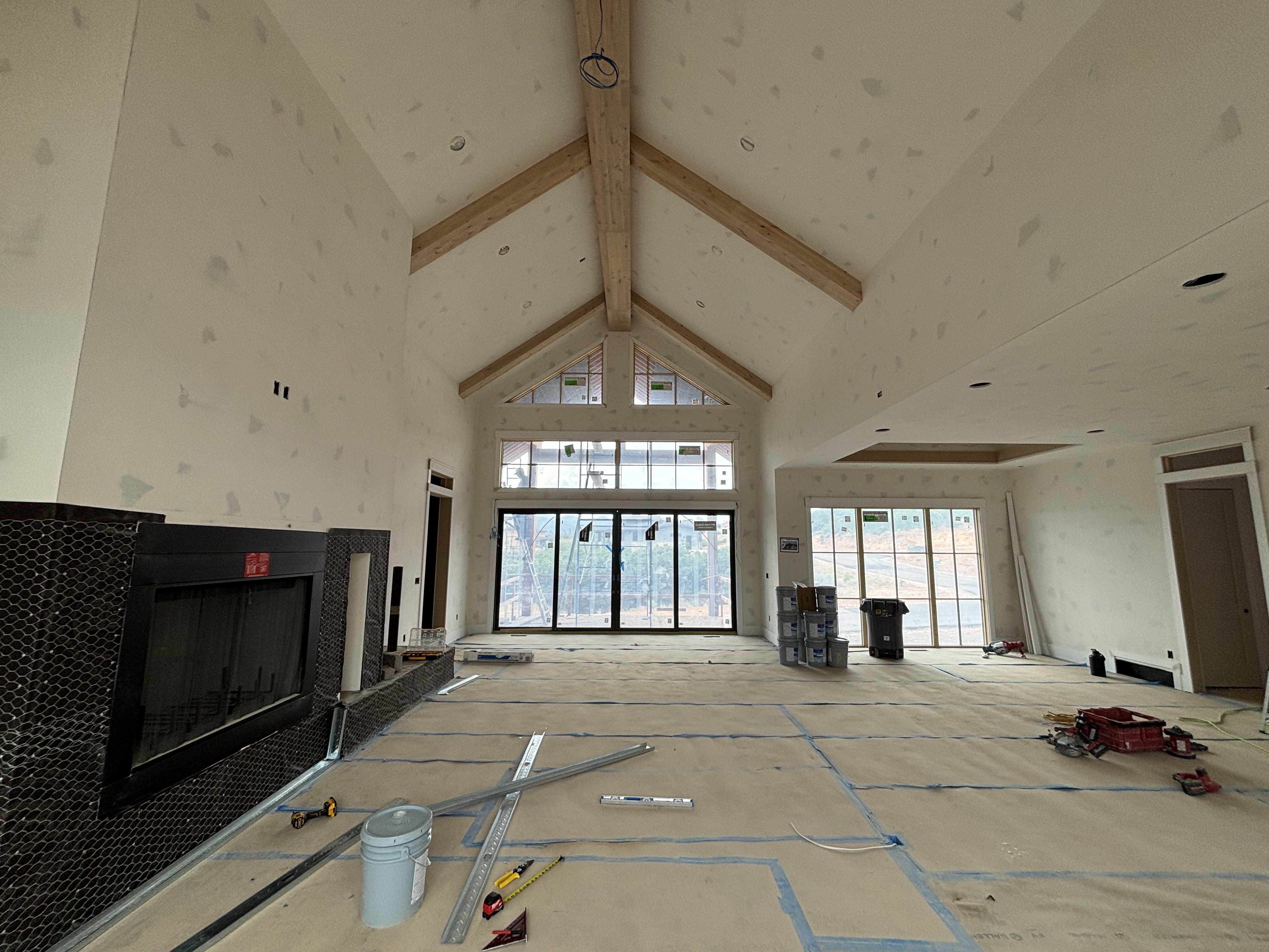 Spacious living space featuring vaulted ceilings
