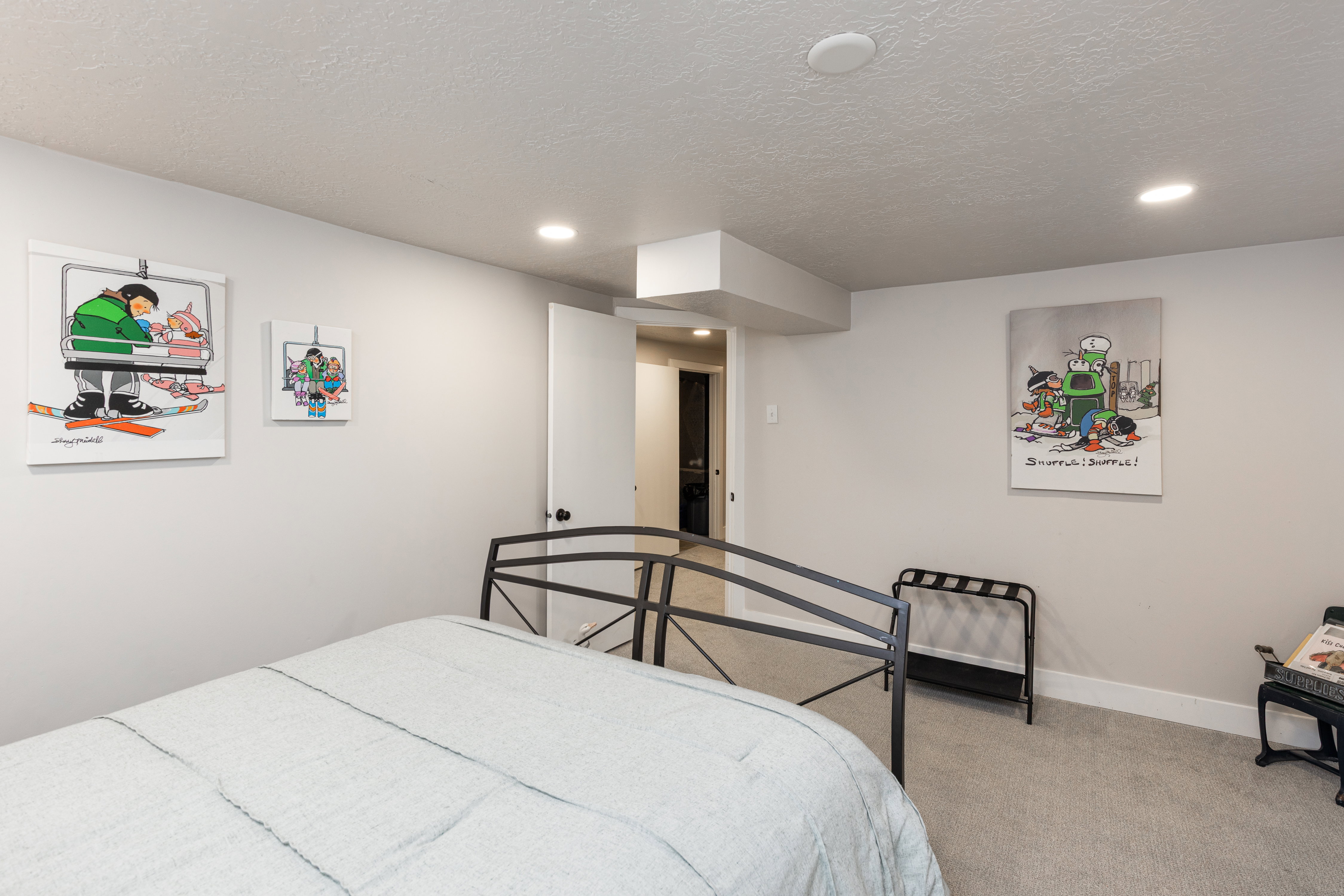 Bedroom featuring neutral wall paint, recessed lighting, and light-toned carpet flooring