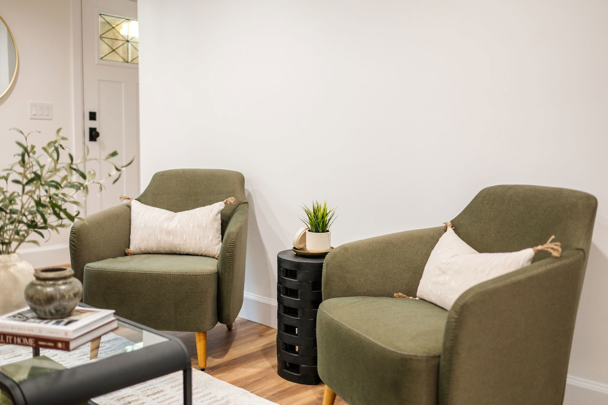 Interior space featuring wood-finish flooring and white walls