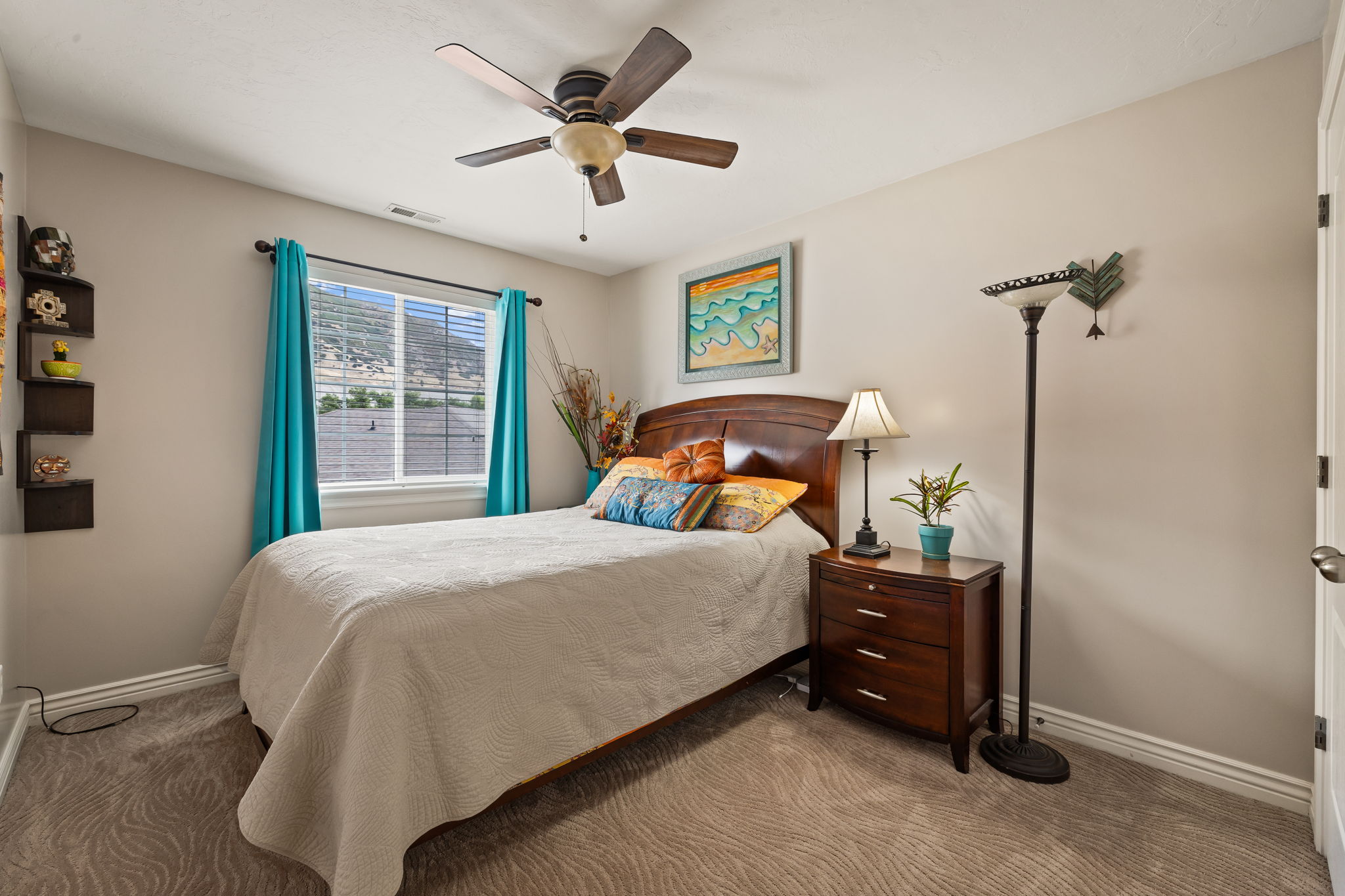 Bedroom featuring carpet floors and a ceiling fan