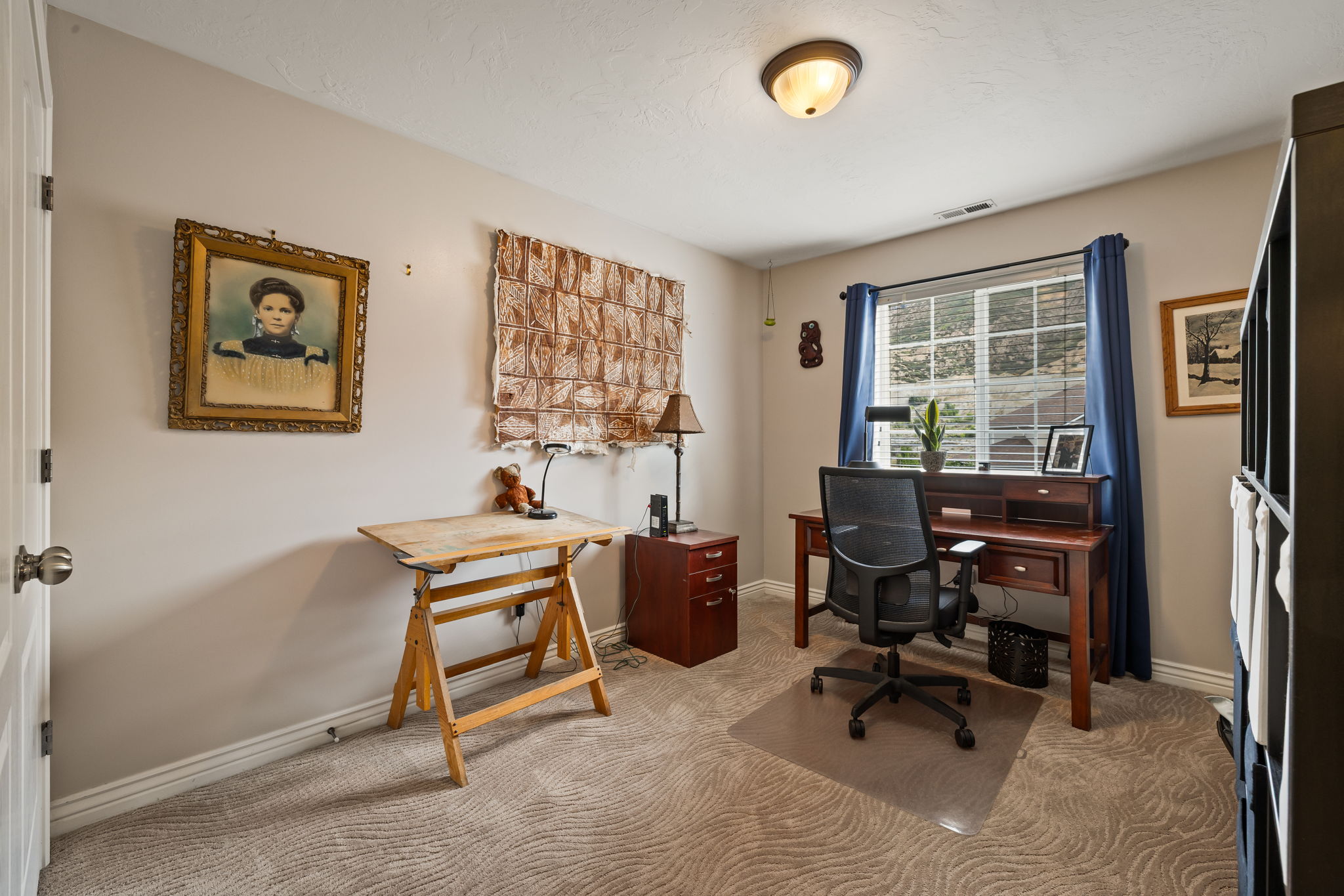 Office space featuring carpet floors and baseboards
