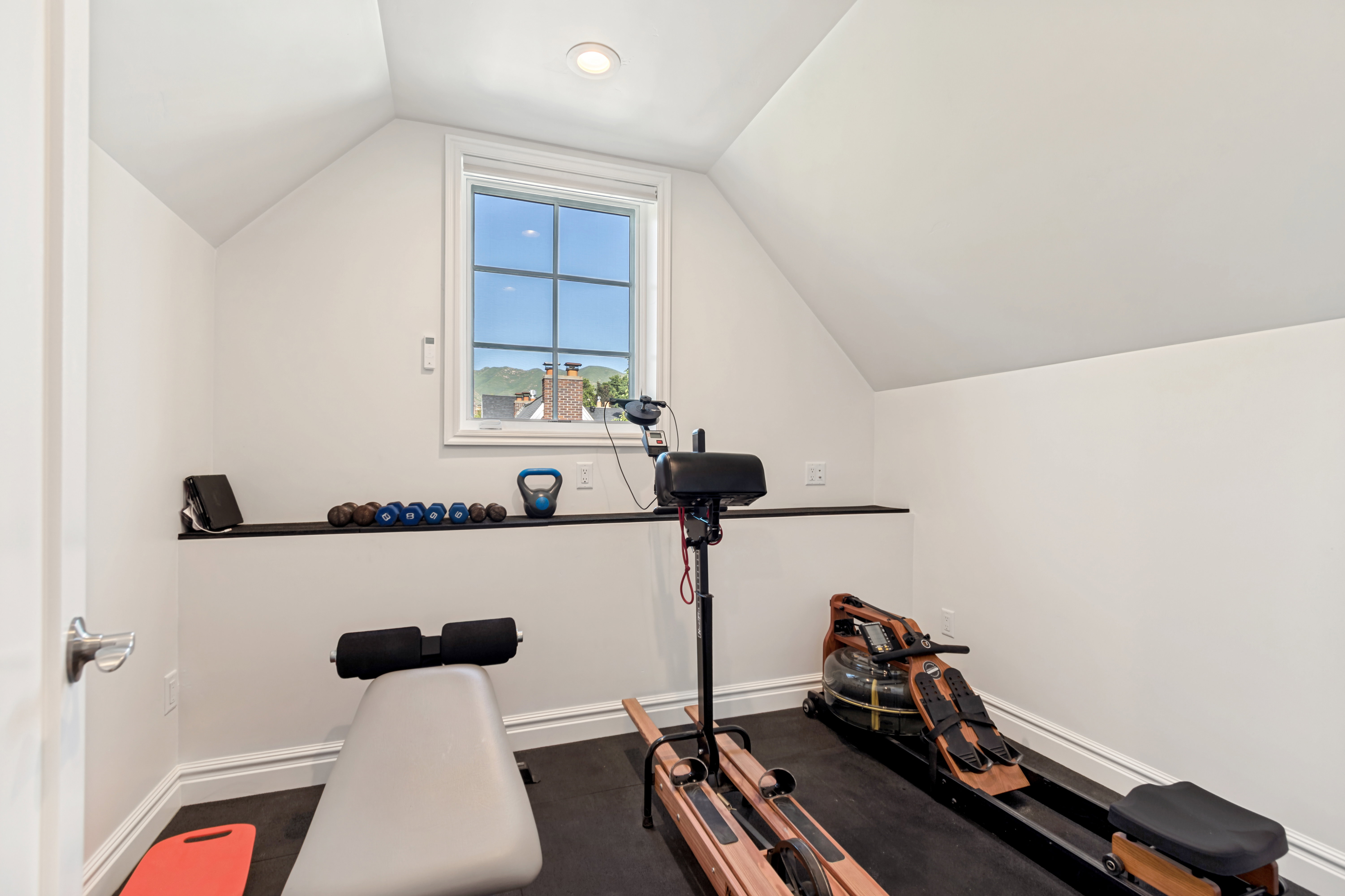 Attic space featuring a window with grid panes, recessed lighting can also be converted by to a 5th bedroom