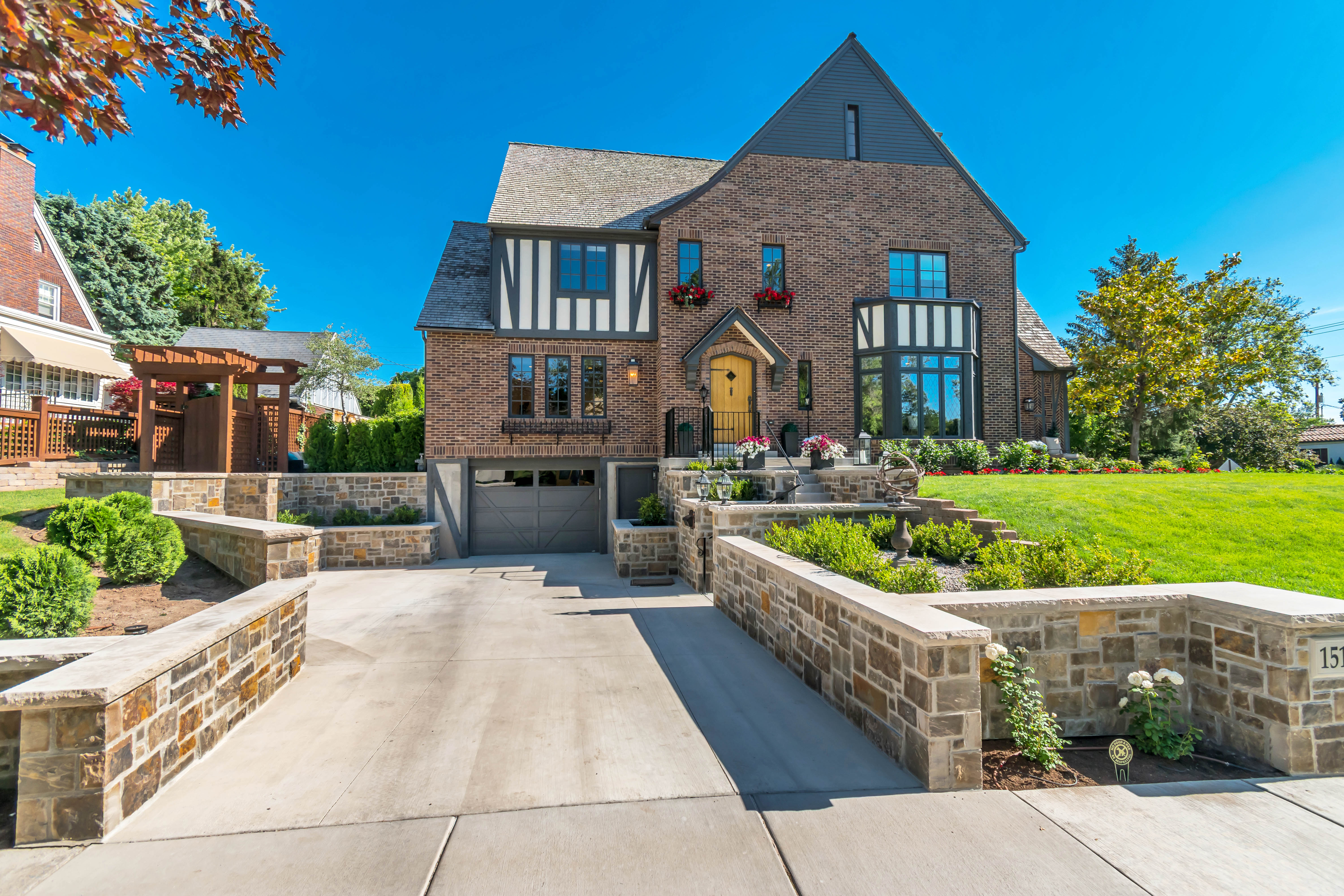 Brick exterior with half-timber detailing and a gabled roofline