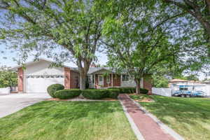 Classic brick charm with welcoming curb appeal!