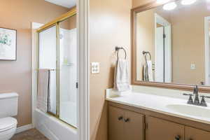 Main bath with large vanity.