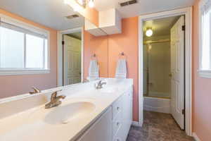En suite bathroom in basement.