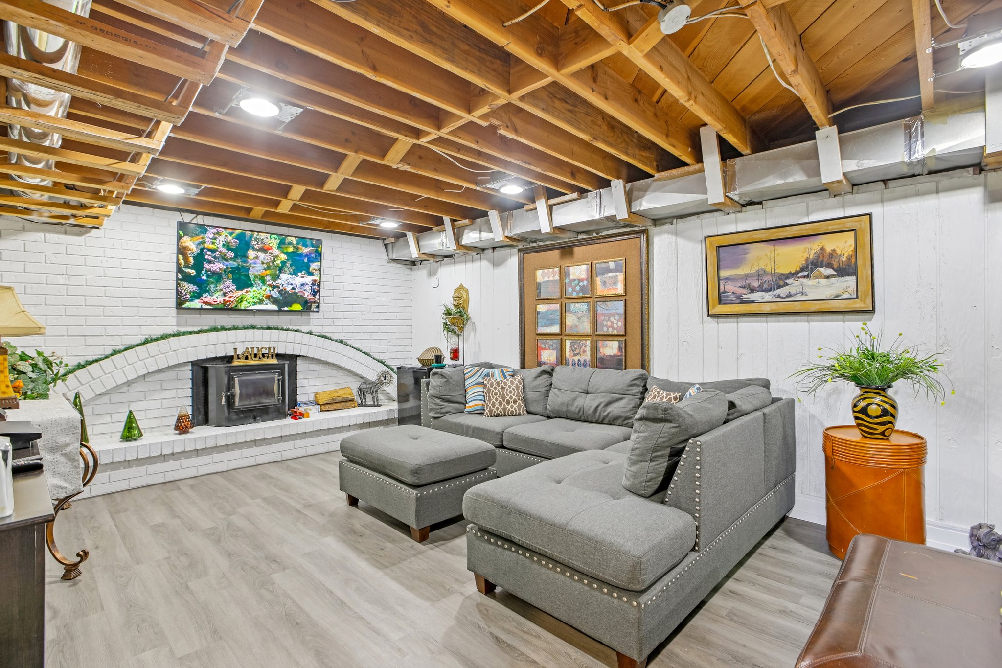 Exposed wood beam ceiling with recessed lighting