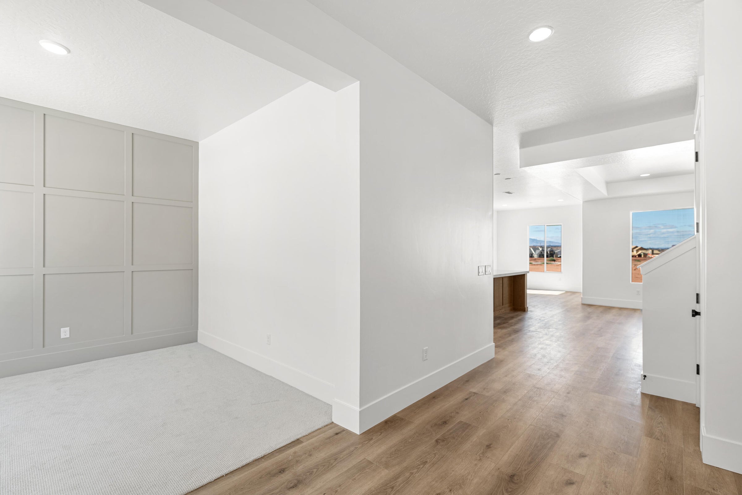 Open concept interior featuring light wood-finish flooring